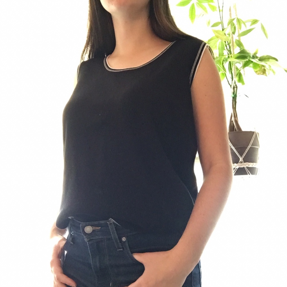 Black sleeveless sweater